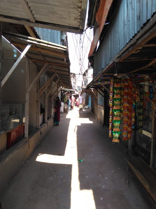 An upgraded street, the second floor usually cantilevers creating an en-tunneling effect